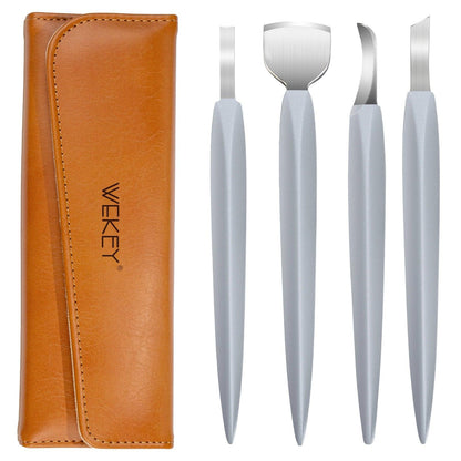 Professional manicure tool set with four silver nail care tools and brown carrying case